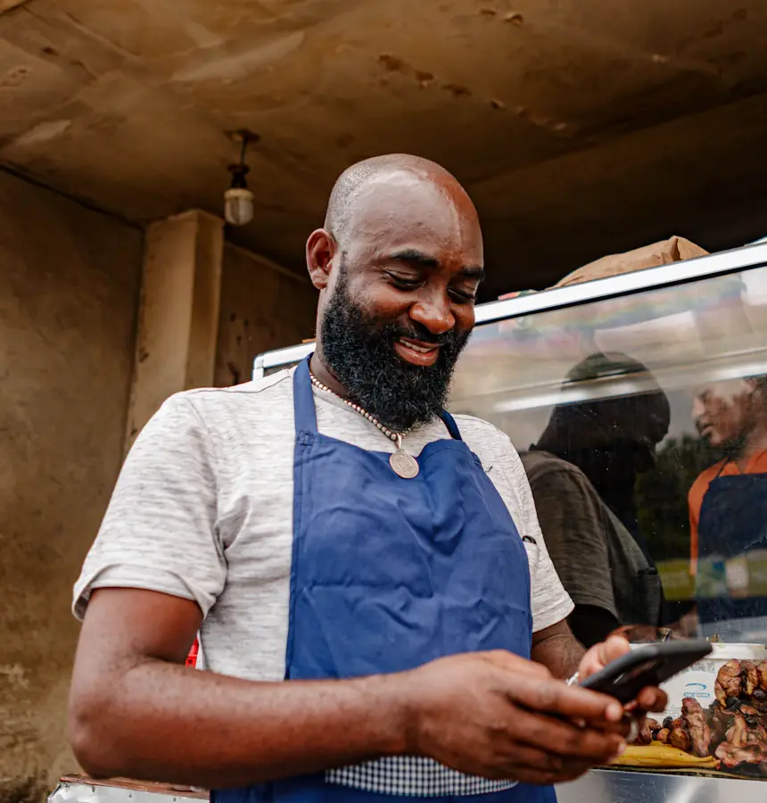 A local small business owner at their counter